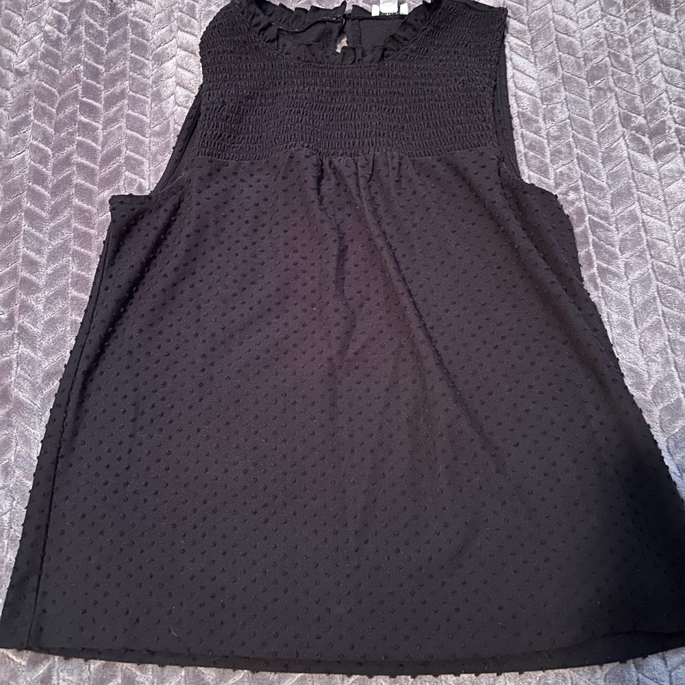 Black polka dot sleeveless blouse
